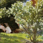 Marie Krøyer sitzt im Liegestuhl im Garten – 1893