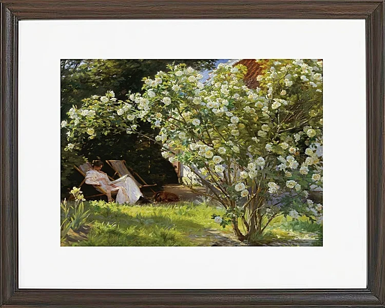 Marie Krøyer sitzt im Liegestuhl im Garten – 1893