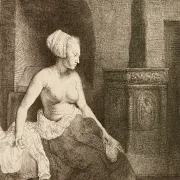 Rembrandt van Rijn | Kvinde sidder halvt påklædt ved siden af ​​et komfur - 1658 | Indrammet kunsttryk | Barok | formida